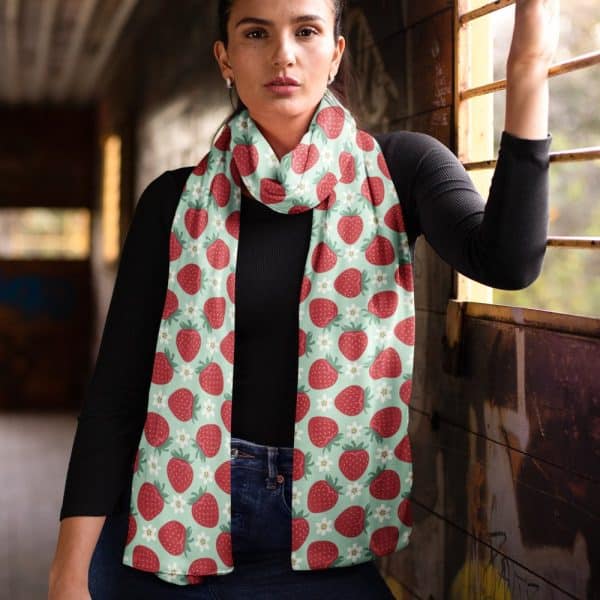 Woman Wearing A Mint Green Strawberry Patterned Scarf.