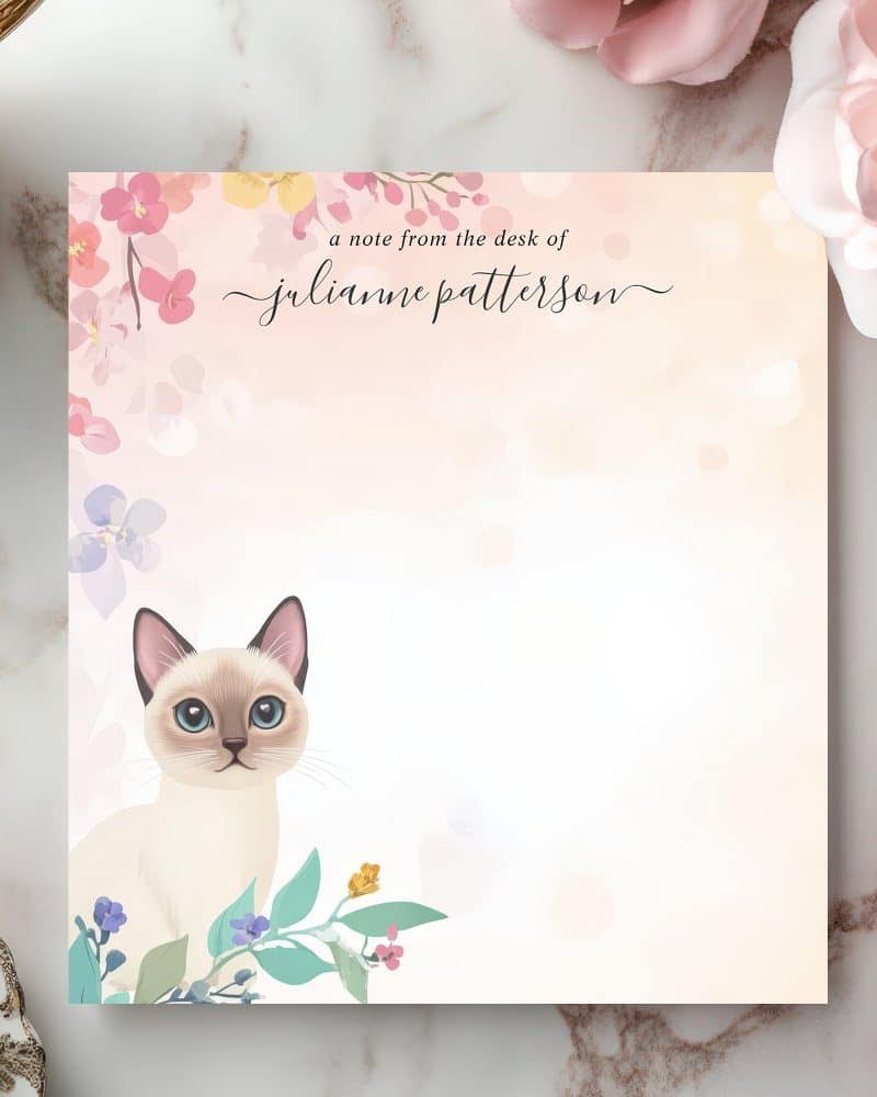 Floral notepad featuring a Siamese cat.