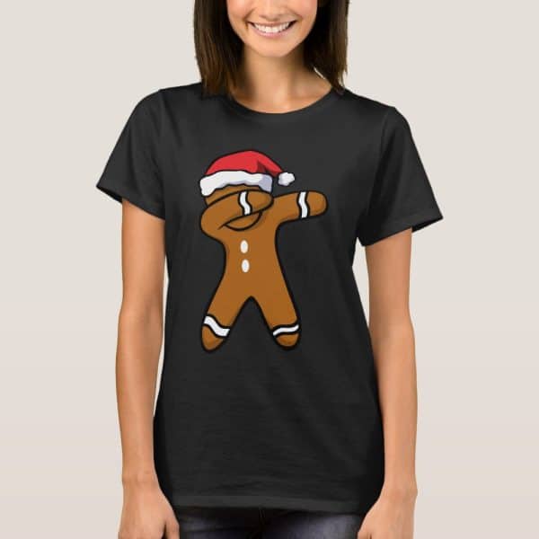 Black T-Shirt Featuring A Gingerbread Man Wearing A Santa Hat And Performing A Dab.