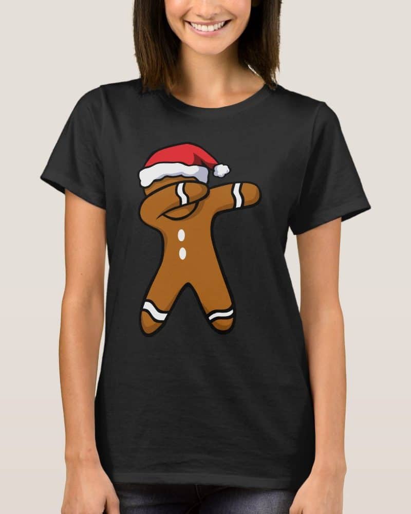 Black t-shirt featuring a gingerbread man wearing a Santa hat and performing a dab.