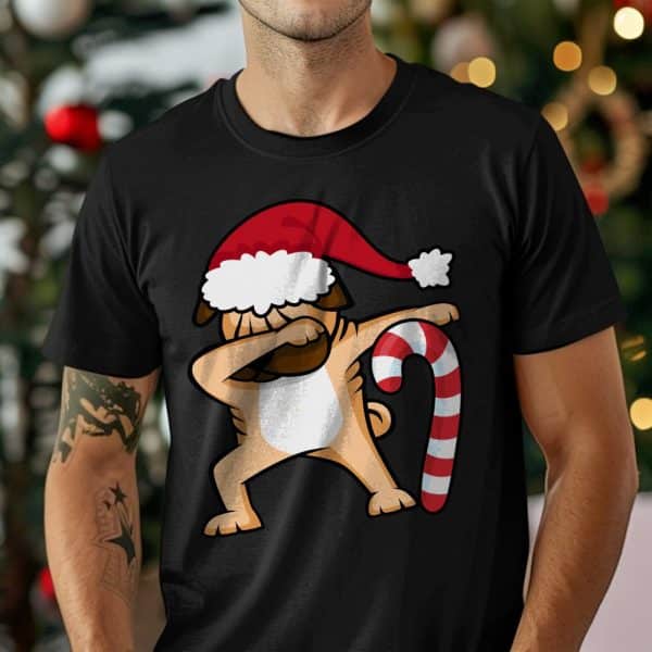 A Person Wearing A Black T-Shirt Featuring A Pug In A Santa Hat Dabbing Next To A Candy Cane.
