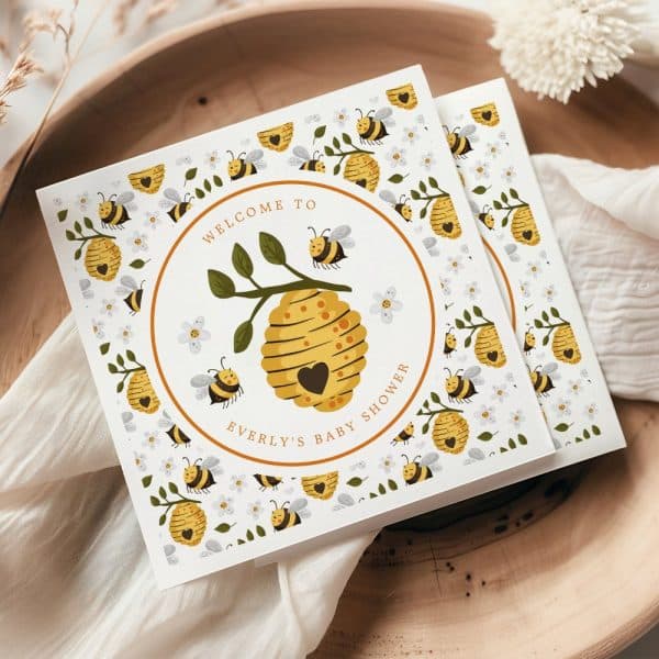 Baby Shower Invitation Featuring A Beehive With Bees And Flowers.