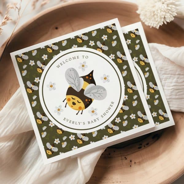 Baby Shower Invitation Featuring A Cartoon Bee And Floral Pattern.