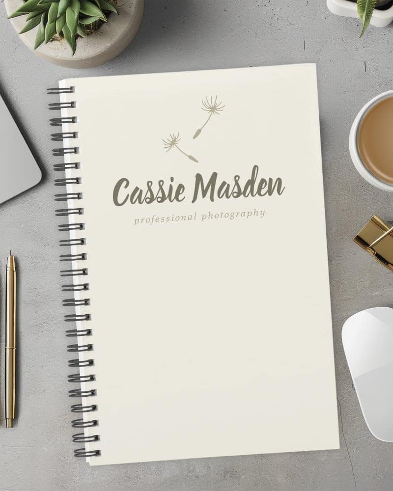 Spiral-bound notepad with Cassie Madsen professional photography logo.