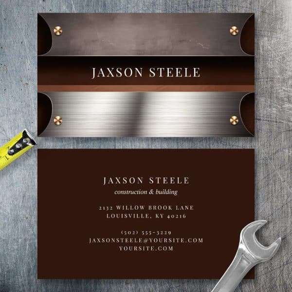 Business Card For Jaxson Steele, Construction And Building. The Card Features A Metallic Design.