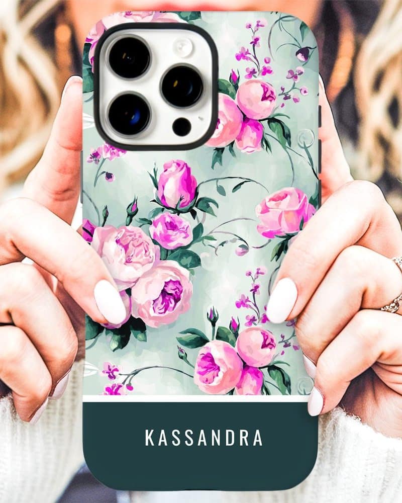 Phone case with a floral design and the name Kassandra at the bottom.