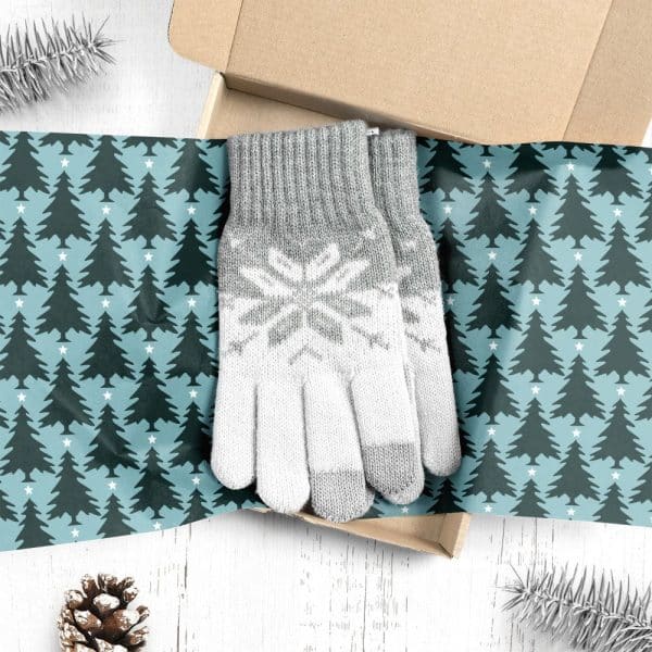 Pair Of Grey And White Knit Gloves With Snowflake Pattern, In A Christmas-Themed Gift Box.