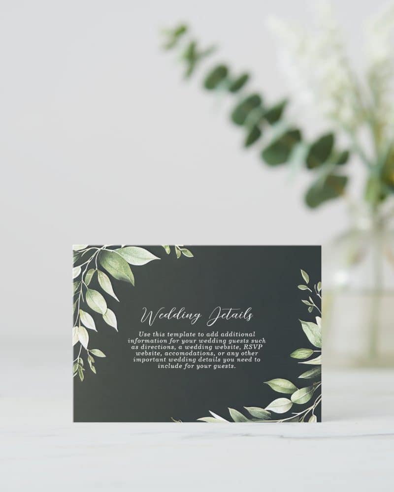 Dark-green wedding details card with light-green leaf border.