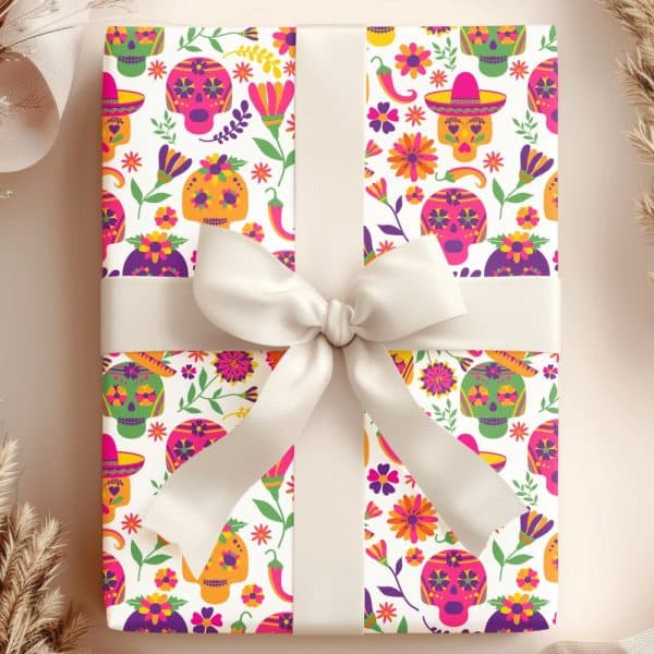 A Gift Wrapped In Colorful Day Of The Dead Patterned Paper, Tied With A Cream-Colored Ribbon.