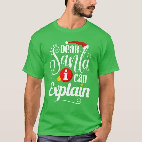 Man Wearing A Bright Green T-Shirt With A Christmas Design That Says Dear Santa I Can Explain.
