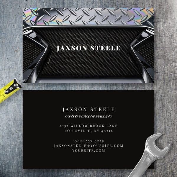 Jaxson Steele Construction And Building Business Card Featuring A Metallic And Carbon Fiber Design.