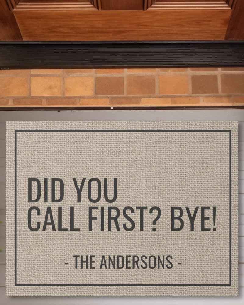 Beige doormat with the text Did You Call First? Bye! The Andersons.