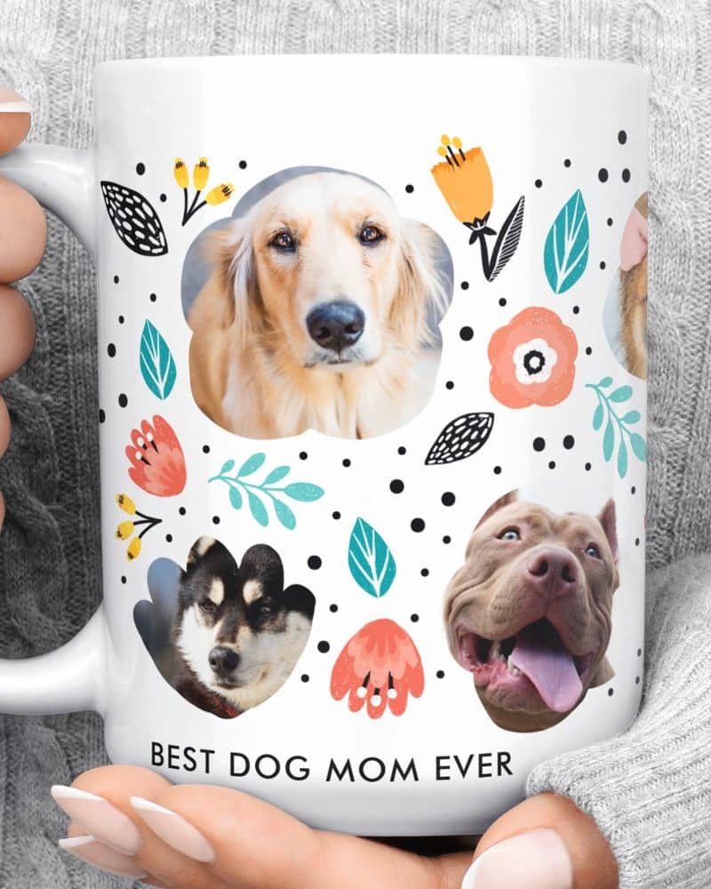 White coffee mug displaying a floral design and multiple photos of dogs. The mug reads Best Dog Mom Ever.