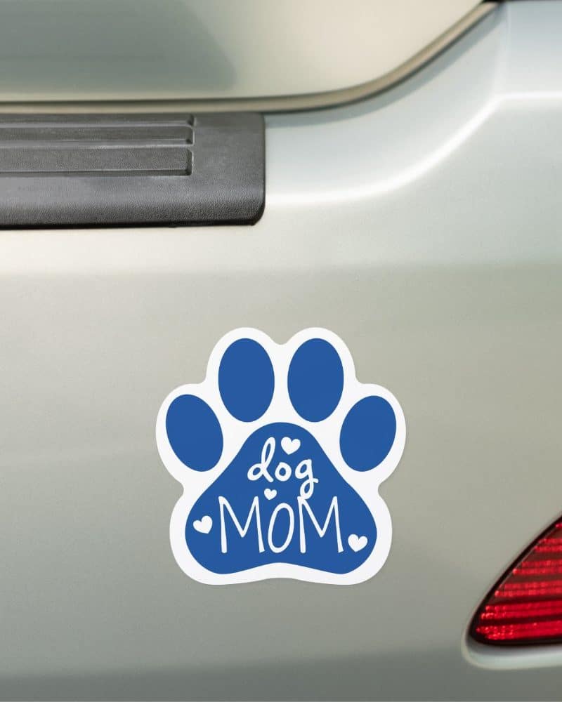 Blue paw print car magnet with Dog Mom in the center.