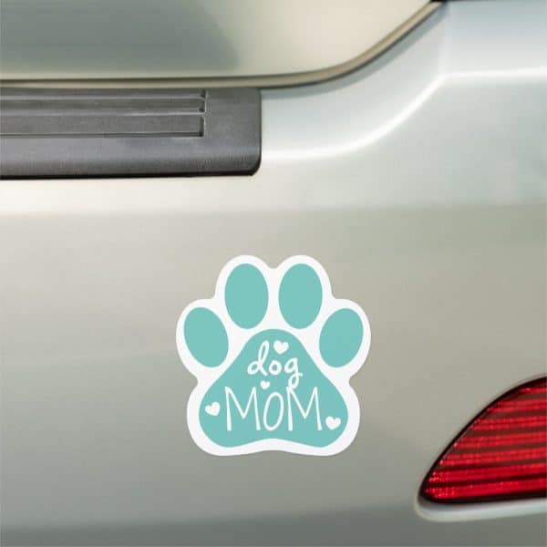 A Teal Paw Print Magnet On A Car Bumper, Reading Dog Mom.