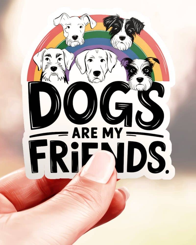 A hand holds a sticker that says Dogs Are My Friends, with five different dog breeds illustrated above the text, set against a rainbow.