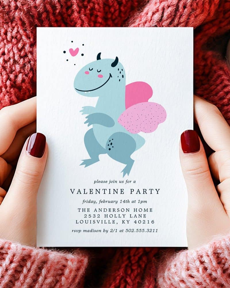 A Valentine's Day party invitation featuring a cute, light-blue dragon with pink wings.