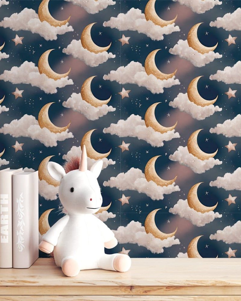 White unicorn plush toy sits in front of a dark blue night sky wallpaper featuring gold crescent moons and fluffy clouds.