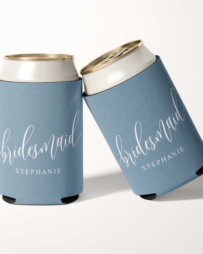 Two blue bridesmaid can coolers with the name Stephanie printed on them.