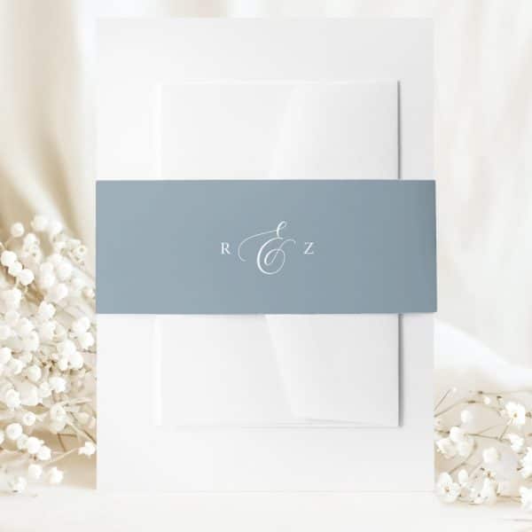 Wedding Invitation With A Light Blue Band Displaying A Monogram And The Initials R &Amp; Z.