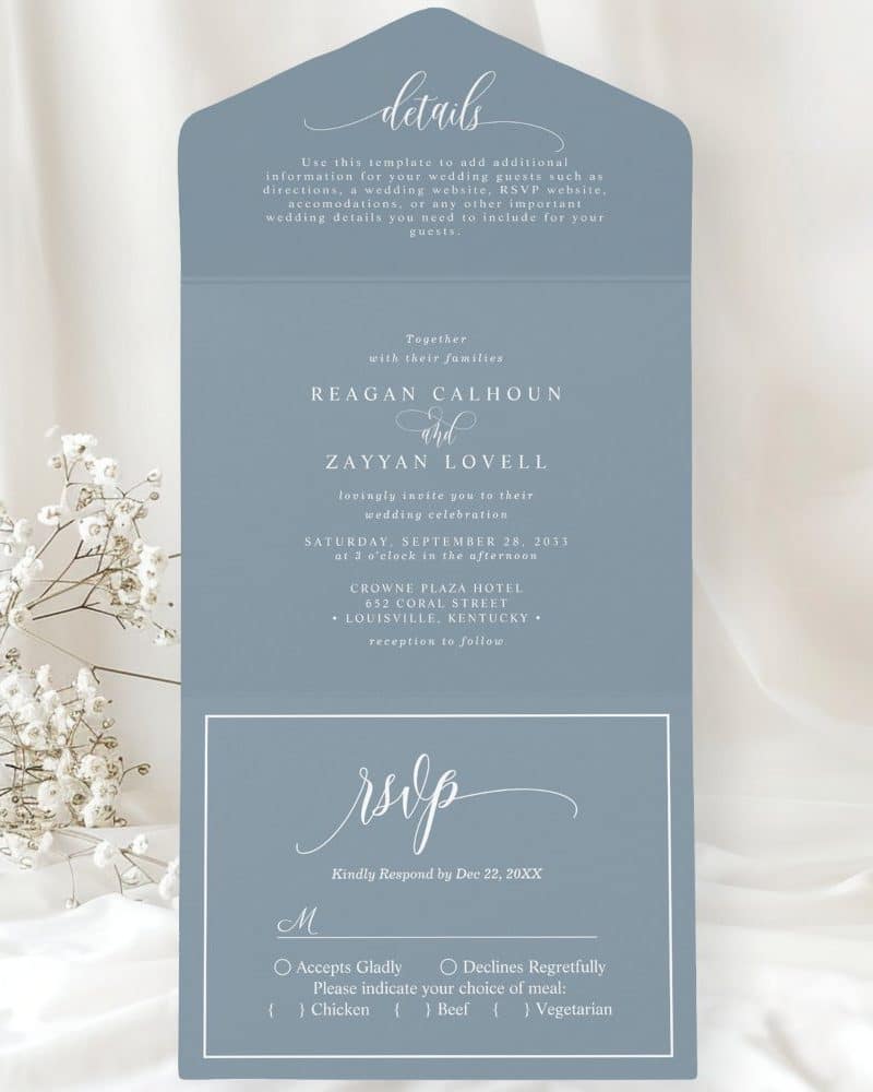 A blue wedding invitation with the names Reagan Calhoun and Zayyan Lovell, the date, time, and location of the ceremony, and an RSVP section.