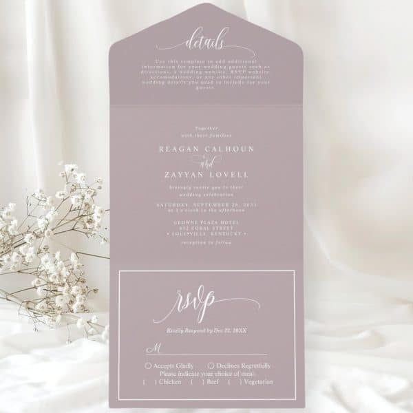 Purple Wedding Invitation With Regan Calhoun And Zayyan Lovell'S Names, Wedding Date, Time, And Location. Rsvp Details Are Included.