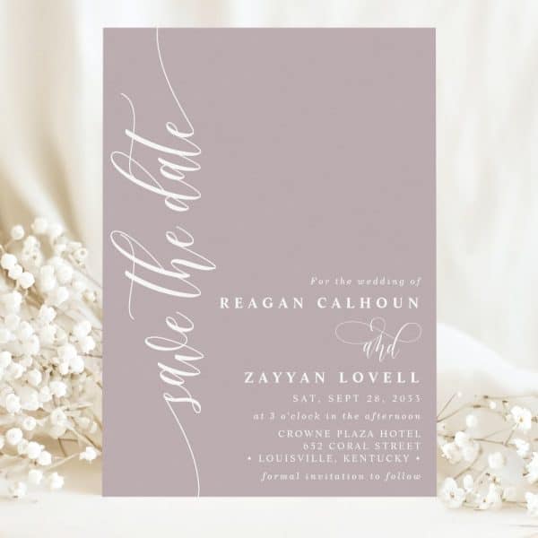 Dusty Rose Save-The-Date For The Wedding Of Reagan Calhoun And Zayyan Lovell, September 28, 2033, At The Crowne Plaza Hotel In Louisville, Kentucky.