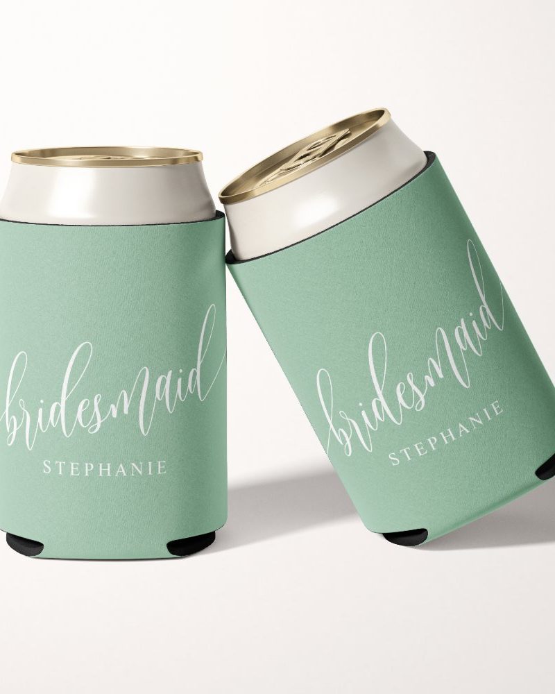 Two mint green can coolers with the word bridesmaid and a name, Stephanie, printed on them.