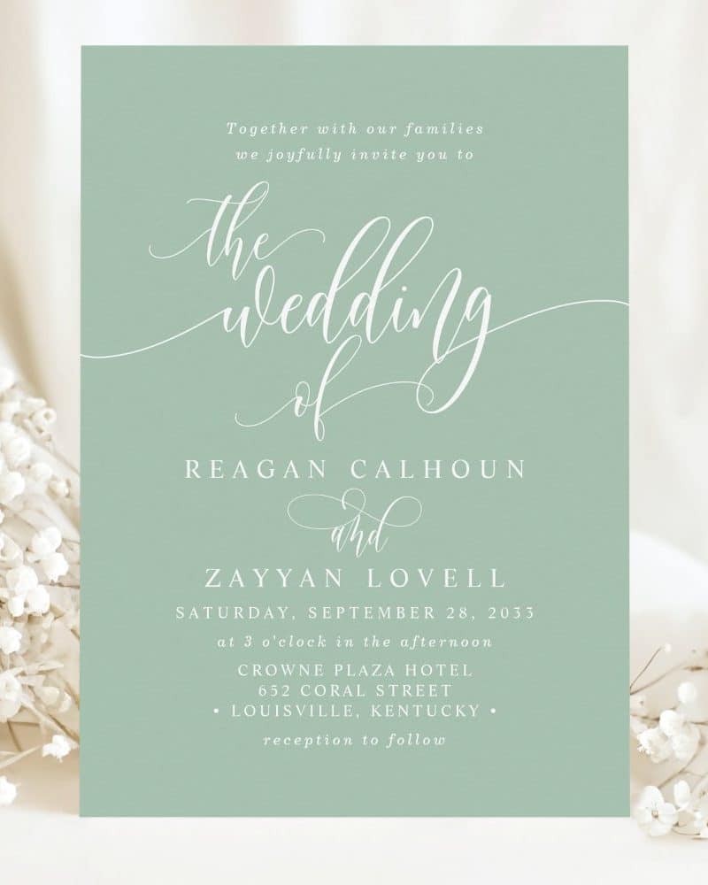 Sage green wedding invitation for Reagan Calhoun and Zayyan Lovell. The invitation includes the date, time, and location.