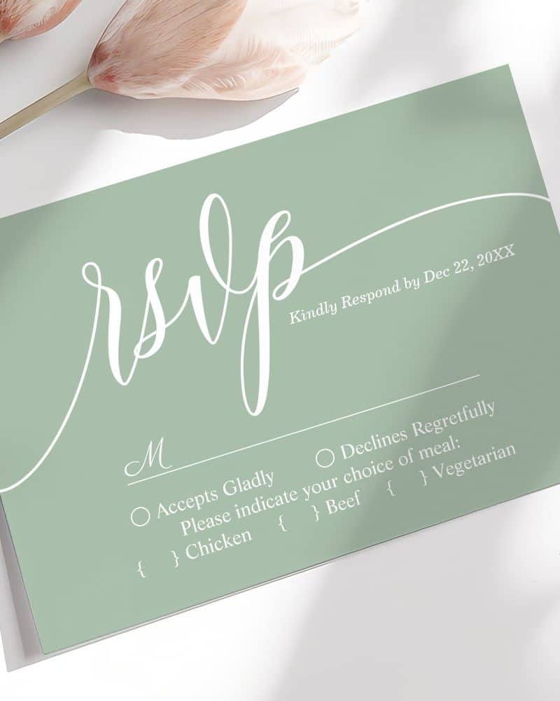 Sage green RSVP card with white script lettering and meal choices.