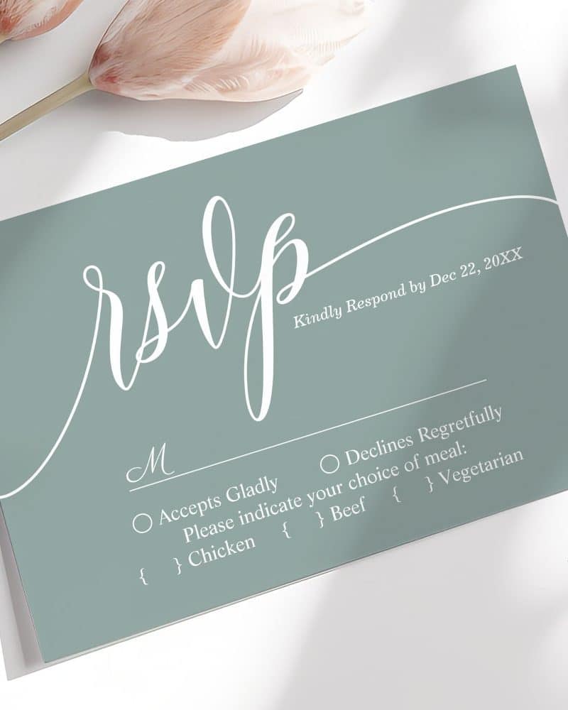 Sage green RSVP card with white script lettering and meal choices.