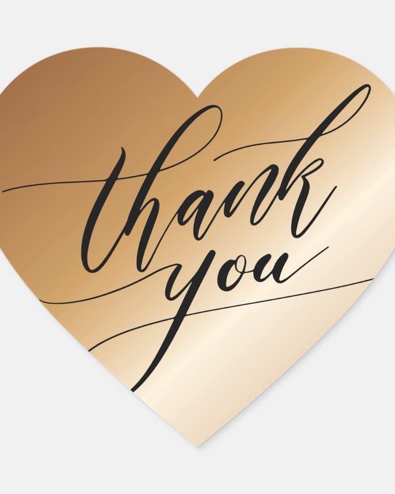Gold heart-shaped thank you note.