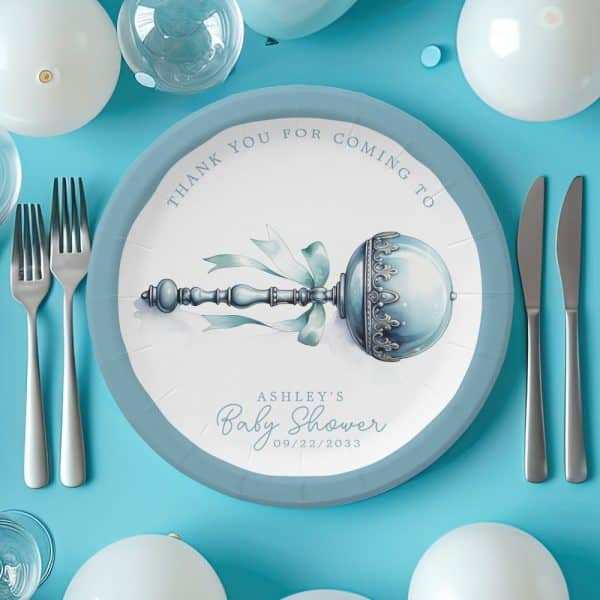 A Baby Shower Thank You Plate Featuring A Watercolor Rattle Design, Ashley'S Name, And The Date 09/22/2033.