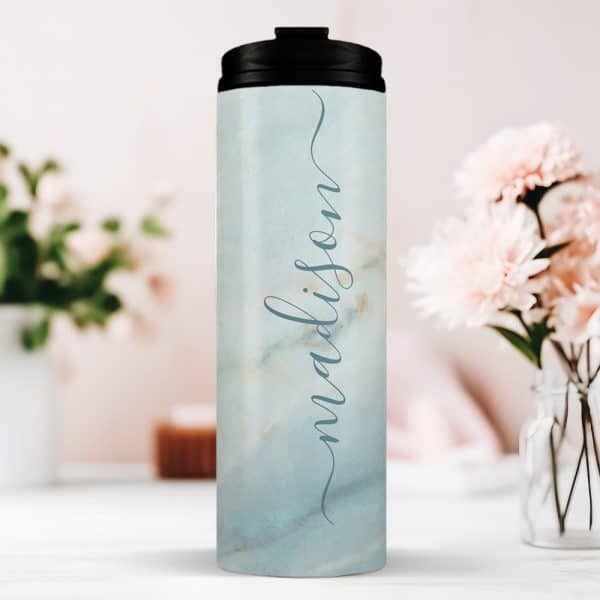 Personalized Light Blue Marble Tumbler With The Name Madison.