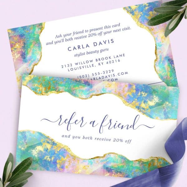 Referral Card For Carla Davis, Stylist, Featuring An Abstract Pastel And Gold Design.
