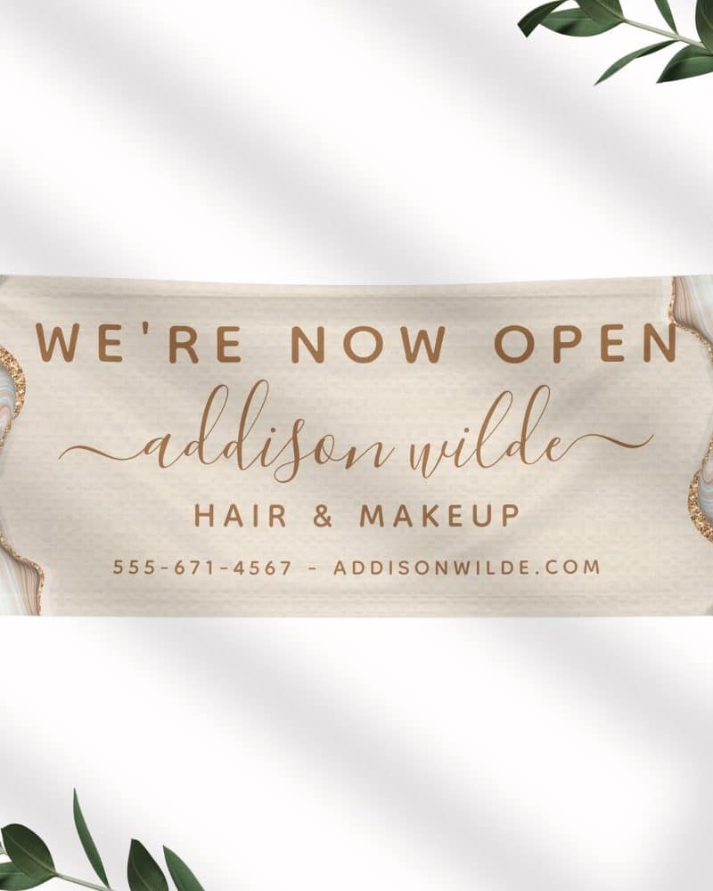 Grand opening announcement for Addison Wilde Hair & Makeup, featuring a beige banner with gold accents.