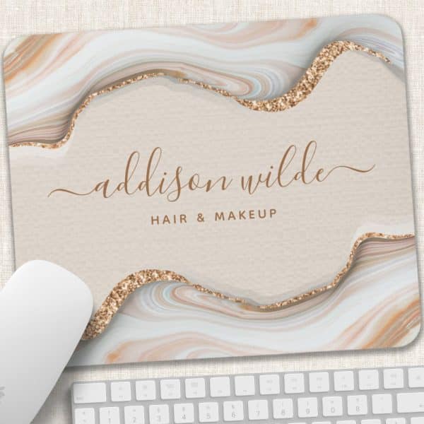 Mousepad Featuring Addison Wilde Hair &Amp; Makeup Logo; Design Incorporates A Beige Marble Pattern With Gold Glitter Accents.