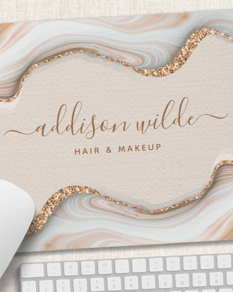 Mousepad featuring Addison Wilde Hair & Makeup logo; design incorporates a beige marble pattern with gold glitter accents.