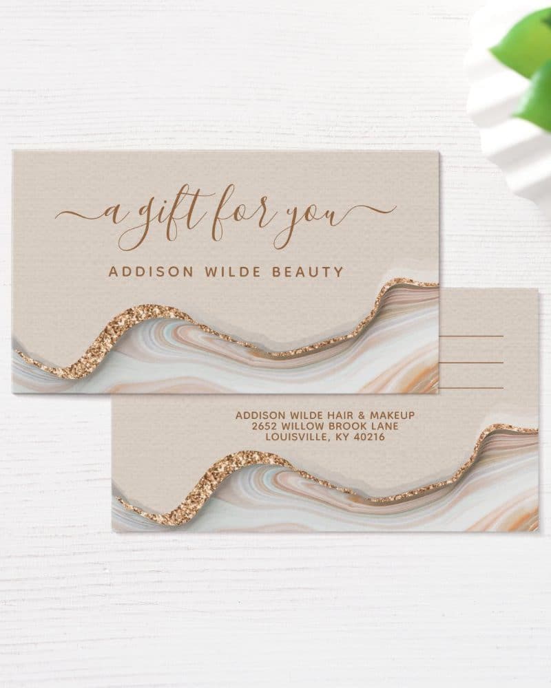 Gift certificate for Addison Wilde Beauty, featuring a beige background with gold glitter and agate design.