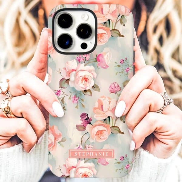 A Woman'S Hands Hold A Phone Case With A Pastel Floral Pattern And The Name Stephanie.