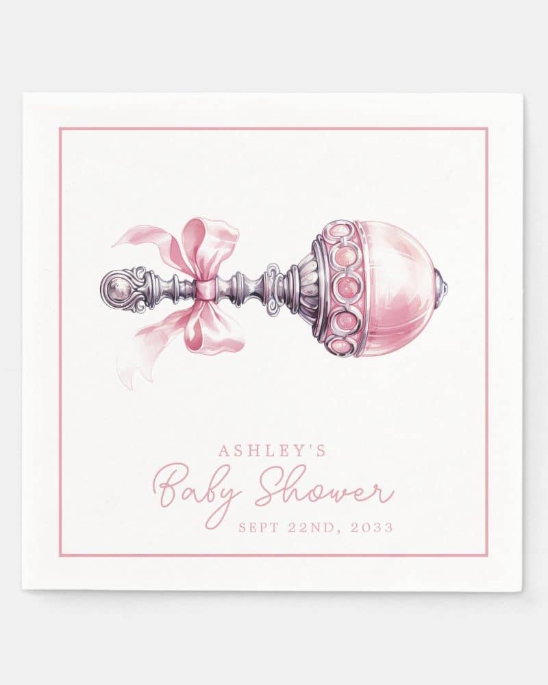 Pink and silver baby rattle with a pink ribbon, Ashley's baby shower invitation, September 22, 2033.