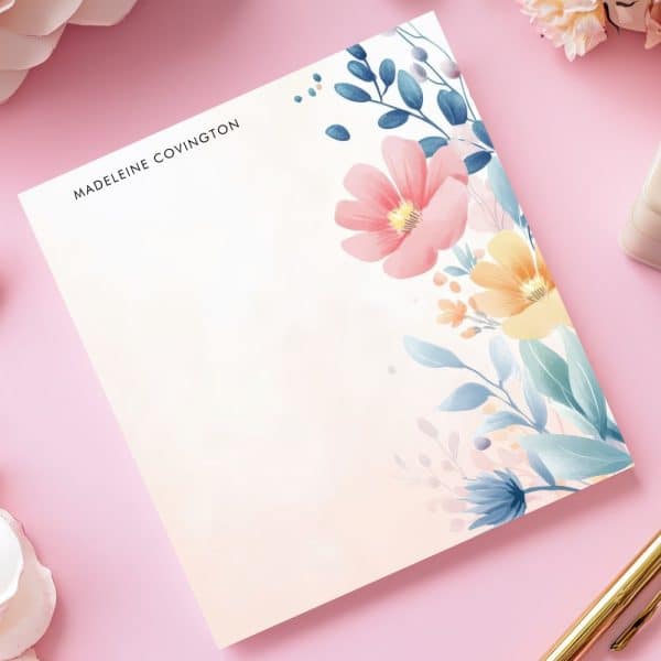 Floral Notepad With Madeleine Covington'S Name At The Top.