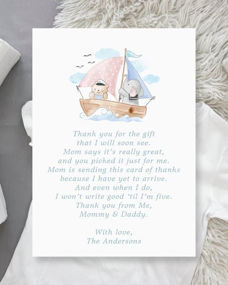 Baby thank you card featuring watercolor illustration of a bear and elephant sailing a boat.