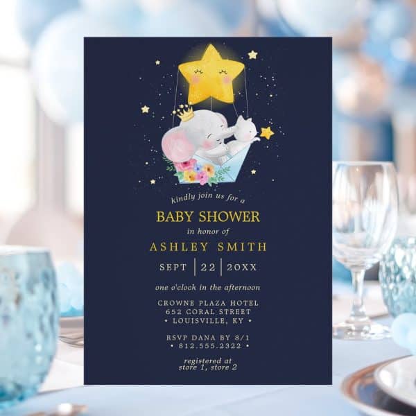 Baby Shower Invitation Featuring A Cute Illustration Of An Elephant And Cat Riding In A Hot Air Balloon-Shaped Star.