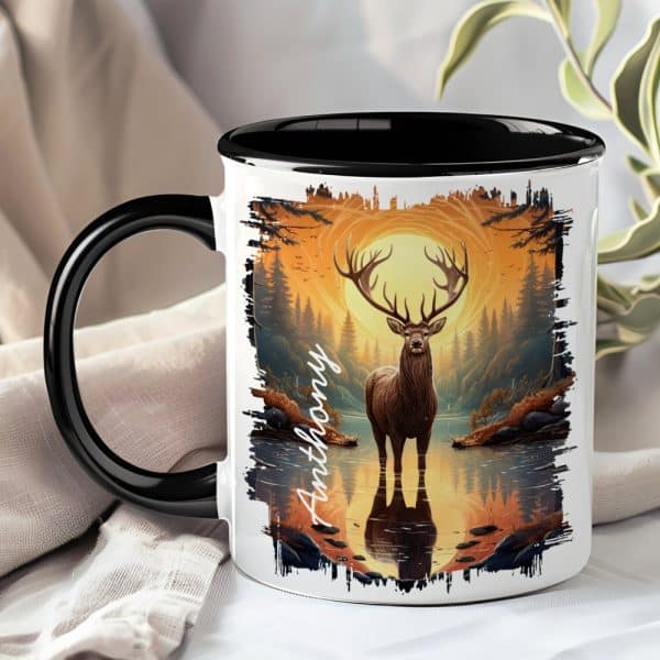 Black-Handled Mug With A Personalized Name, Anthony, And A Graphic Of A Large Stag Standing In A Forest Reflecting In Water At Sunset.