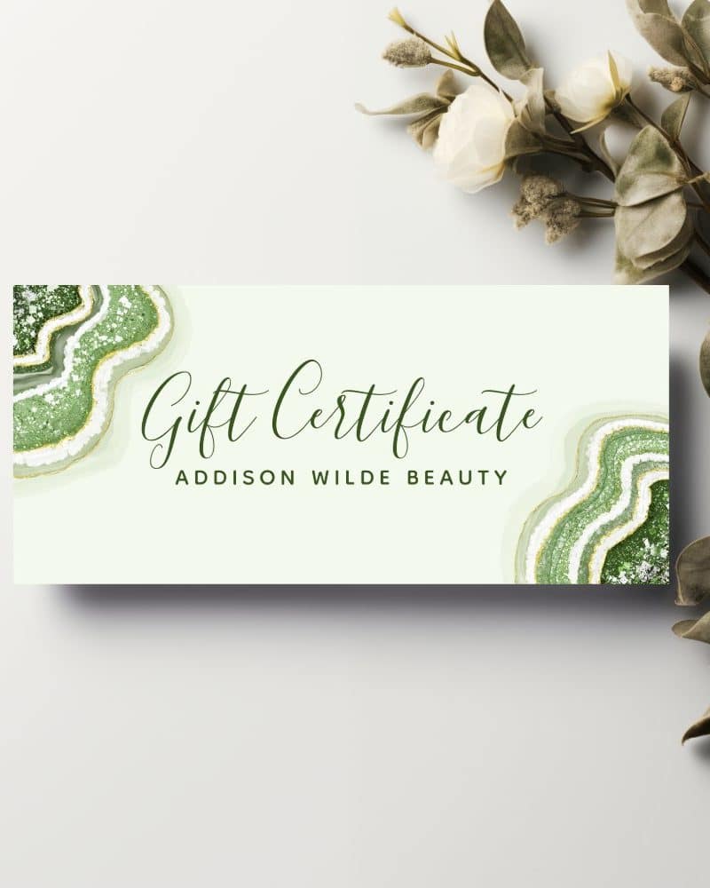 Addison Wilde Beauty gift certificate featuring a green and gold agate design.