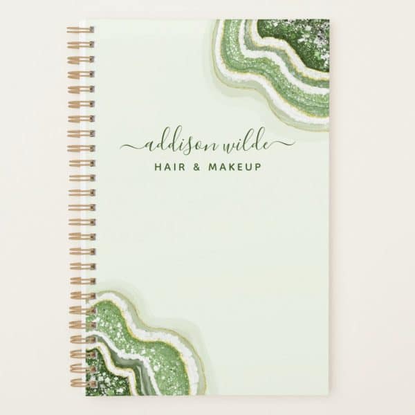 Spiral-Bound Notebook With A Light Green Cover Featuring Green And Gold Agate Designs And The Name Addison Wilde Hair &Amp; Makeup.