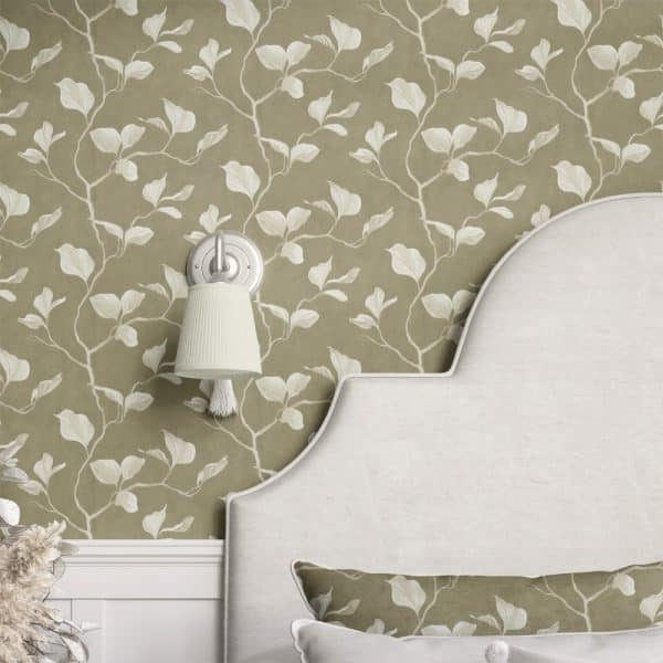 A Curved Headboard Against A Wall With A Leafy Botanical Wallpaper.