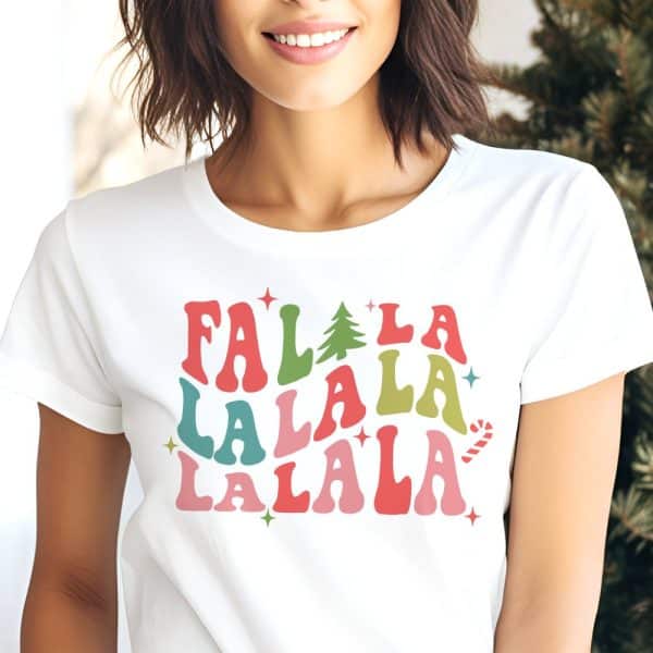 Woman Wearing A White T-Shirt With A Colorful Falala Design.