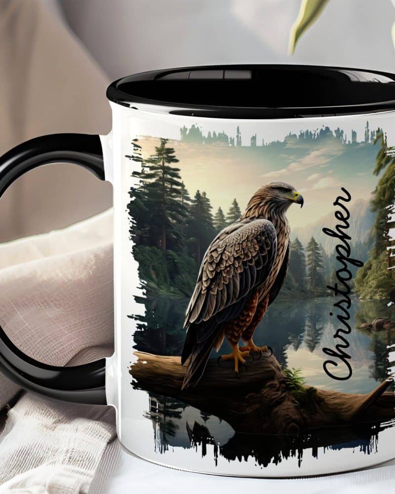 Black-handled mug with a graphic of an eagle perched on a branch by a lake in a forest, personalized with the name Christopher.